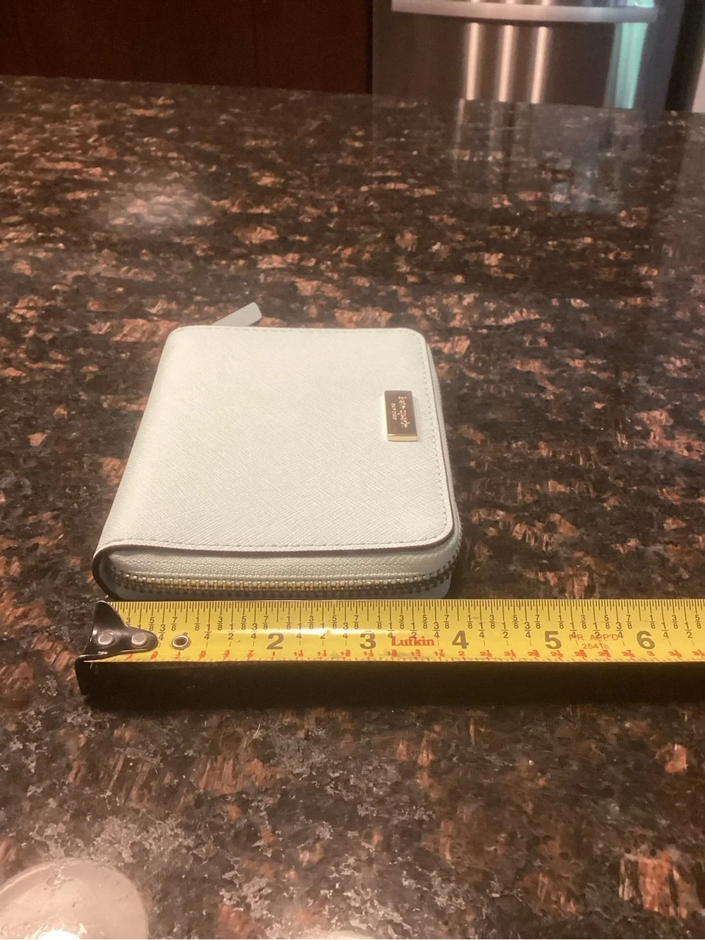 kate spade pale blue small flap wallet with gold plaque
